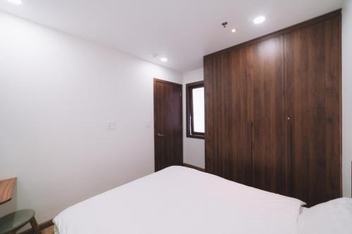 Katil atau katil-katil dalam bilik di Dalat Center Residence