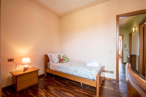Postel nebo postele na pokoji v ubytování Villa Mirarino