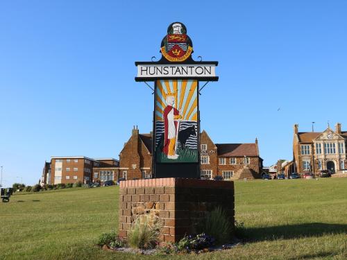 a sign in the middle of a field at 5a Hideaways in Hunstanton
