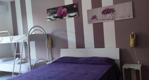 Una cama o camas en una habitación de B&B Extremo Sud