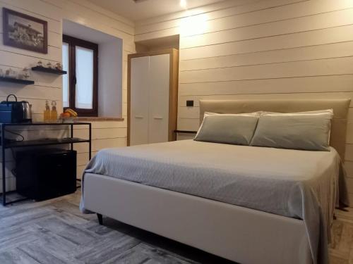 Postel nebo postele na pokoji v ubytování B&B ai SILIO