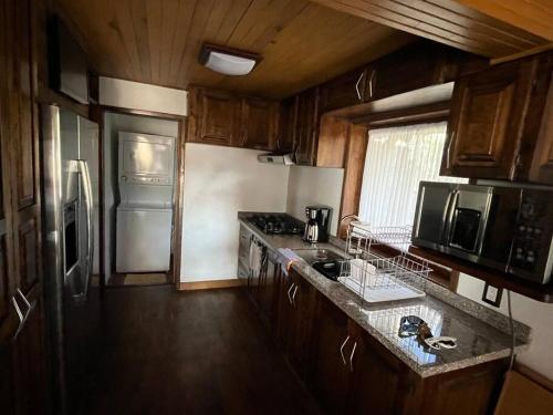 Kuchyň nebo kuchyňský kout v ubytování Agradable cabaña en Tapalpa