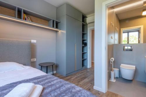 Postel nebo postele na pokoji v ubytování Villa Melody, a luxurious Holiday Retreat