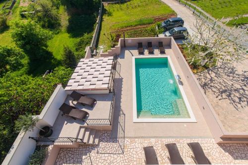 an overhead view of a swimming pool on a house at Pipo in Rijeka