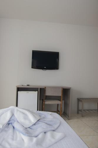Μια τηλεόραση ή/και κέντρο ψυχαγωγίας στο Hotel Termas do Lago