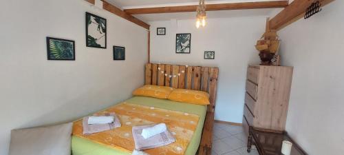 a small bedroom with a bed in a room at Stunning view-Maleni in Vis