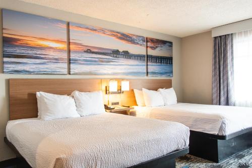 Katil atau katil-katil dalam bilik di Days Inn by Wyndham Troy