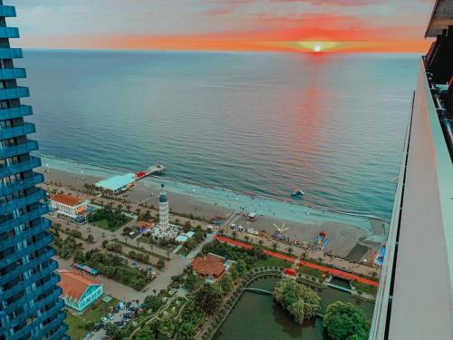 an aerial view of a beach and the ocean at Aparthotel in Batumi