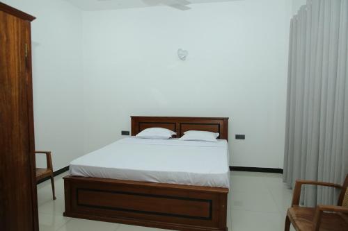Cama o camas de una habitación en Swallow Nest Homes