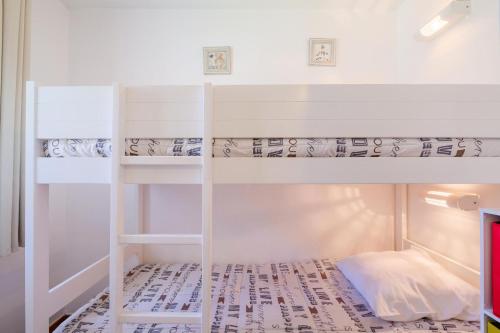 Postel nebo postele na pokoji v ubytování Résidence Les Rivages du Lac - maeva Home - Appartement 2 pièces 7 personnes - Sélection MAE-5661