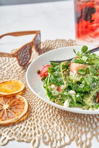 a salad on a plate on a table at Homestead Resort in Midway