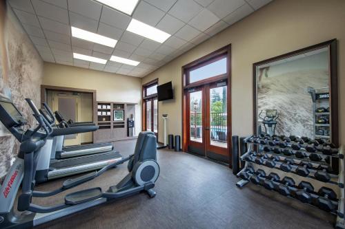 a fitness room with treadmills and a gym at The Westin Sacramento Riverfront Hotel & Spa in Sacramento