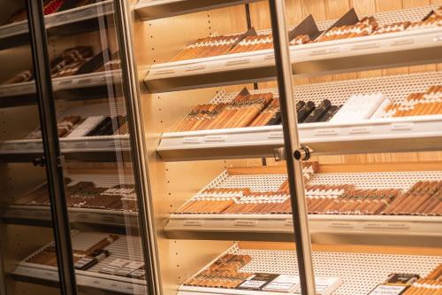 a display case filled with lots of different types of pastries at Sheraton Frankfurt Airport Hotel & Conference Center in Frankfurt/Main