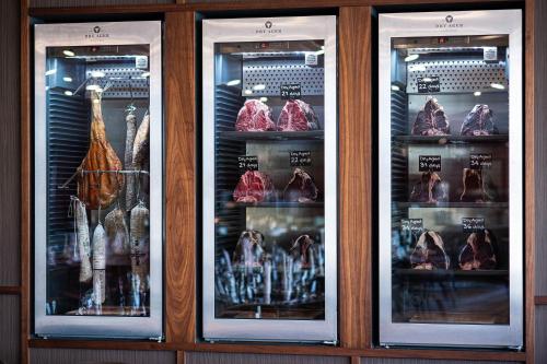 a display case in a store with meat at Sheraton Frankfurt Airport Hotel & Conference Center in Frankfurt/Main