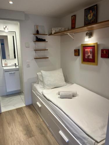 מיטה או מיטות בחדר ב-Fiora Appartaments