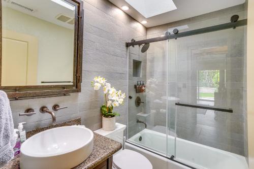 a bathroom with a sink and a shower at Lovely Tustin Home with Outdoor Kitchen 3 Mi to Zoo in Tustin