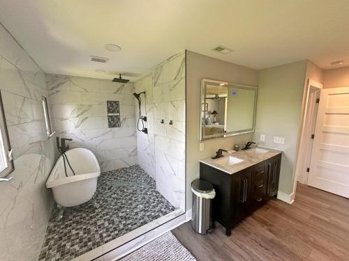 a large bathroom with a sink and a toilet at 2-Bedroom 2-Bath Cozy Home in Nashville's Vibrant in Nashville