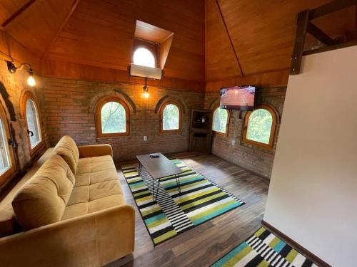 a living room with a couch and a table at River House in Belgrade