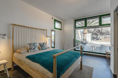 Postel nebo postele na pokoji v ubytování El Socorro