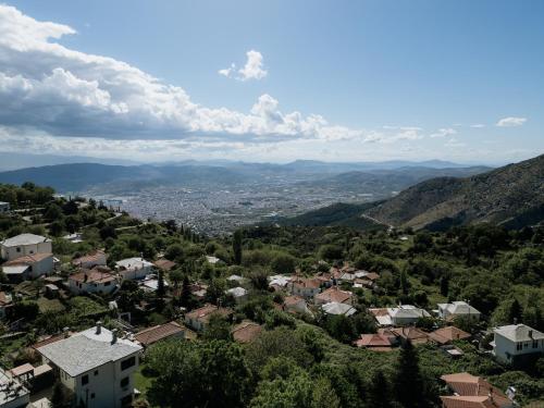 a view of a small town in the mountains at Archontiko Kantartzi in Portariá