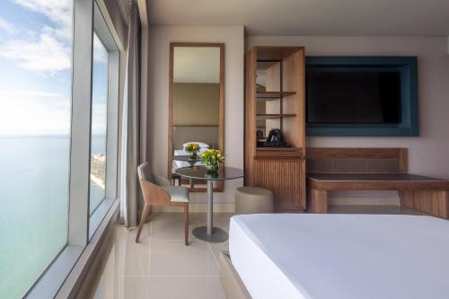 Un ou plusieurs lits dans un hébergement de l'établissement Hyatt Regency Cartagena