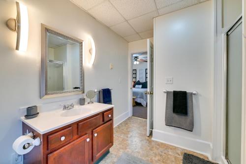 a bathroom with a sink and a mirror at Cozy Mohawk Getaway Near Herkimer Diamond Mines 