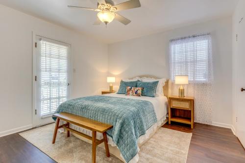 a bedroom with a bed and a ceiling fan at Family-Friendly Home 6 Mi to Downtown Mobile! in Mobile