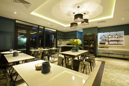 Restoran atau tempat lain untuk makan di Maison Vy Hotel