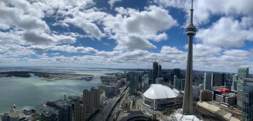 a view of the cn tower in toronto at DOWNTOWN, LUXURY CONDO, CN TOWER, ROGERS CENTER, SCOCIA ARENA, UNOBSTRUCTED VIEW in Toronto