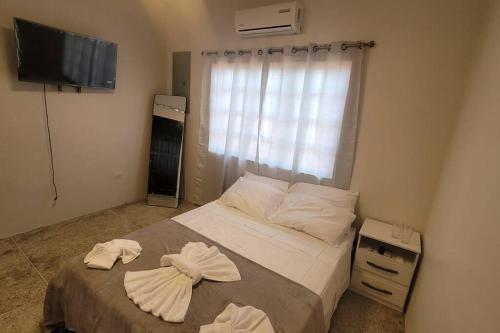 Postel nebo postele na pokoji v ubytování Adorable Arouca 1BDR Apartment