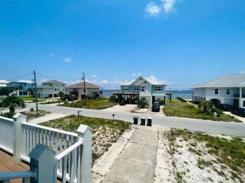 a view of the beach from the balcony of a house at Beautiful Pensacola beach house in Pensacola Beach