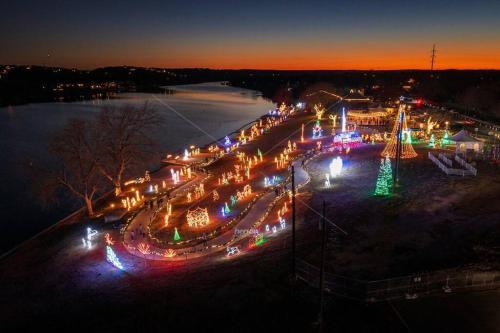 a city lit up at night with lights at A Rare Find! - Bright & Gorgeous Lake Home in Marble Falls in Marble Falls