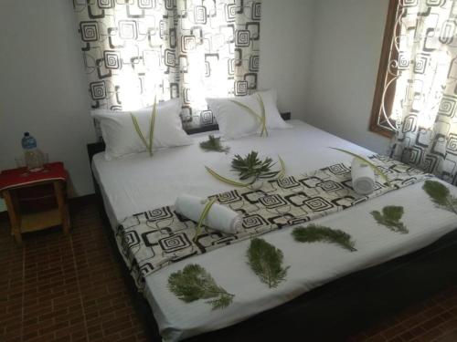 Postel nebo postele na pokoji v ubytování Coastal Heaven Villa