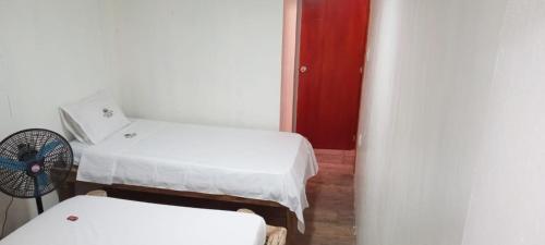 Łóżko lub łóżka w pokoju w obiekcie Venido Del Mar. Neymar
