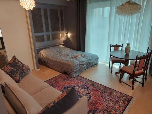 Ένα ή περισσότερα κρεβάτια σε δωμάτιο στο Helsinki-Pasilan Helmi