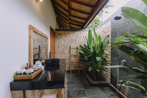 Κήπος έξω από το Unzipp Bungalows Gili Air