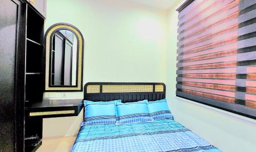 Postel nebo postele na pokoji v ubytování Happy House Quy Nhơn