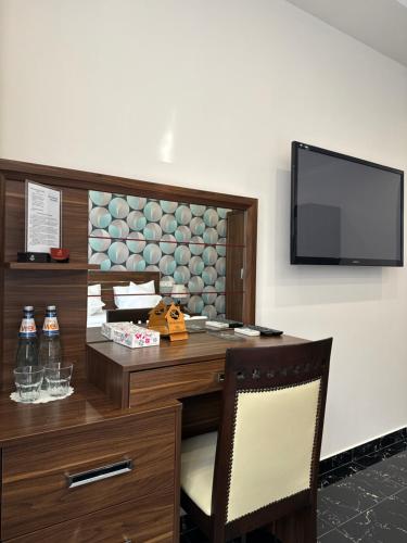 Mia Casa Hotel Yerevanにあるテレビまたはエンターテインメントセンター