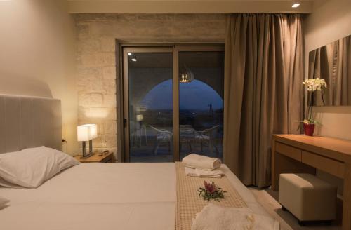 A bed or beds in a room at Libyan Mare