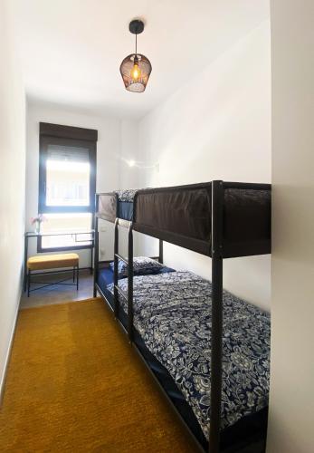Postel nebo postele na pokoji v ubytování Apartamento Arcadia