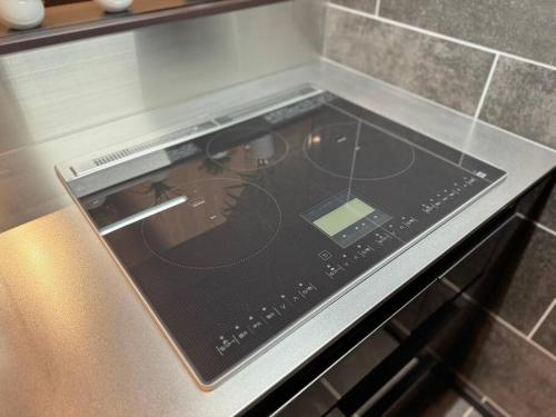 a close up of a stove top in a kitchen at 香季庵Euphoria in Sado
