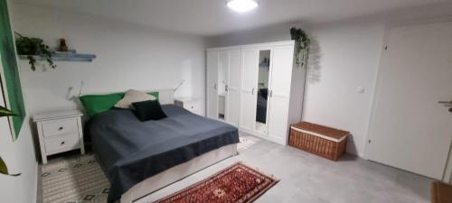 Cama o camas de una habitación en Villa Kunterbunt