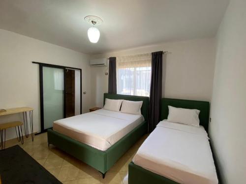 Postel nebo postele na pokoji v ubytování Vavla House
