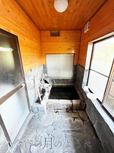 an inside view of a room in a wooden house at 黒川別荘 今宵の月のように in Minamioguni