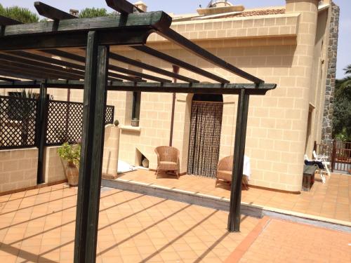 Balcone o terrazza di Villa al mare Baia Emiri Mazzaforno Cefalù