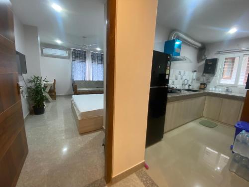 Kuchyň nebo kuchyňský kout v ubytování Stayat47Rajgarh