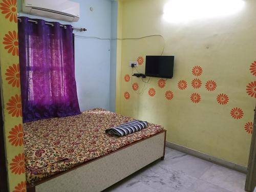 Krevet ili kreveti u jedinici u okviru objekta Amar Priya guest house