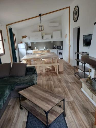 a living room with a couch and a table at A Pieve in Vico