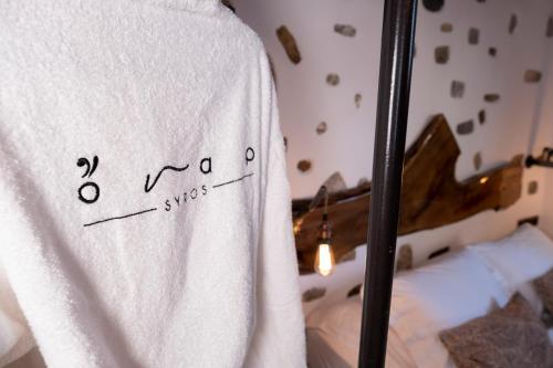 Una cama o camas en una habitación de ONAR LUXURIES