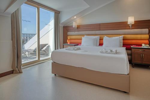 Letto o letti in una camera di Megasaray Westbeach Antalya
